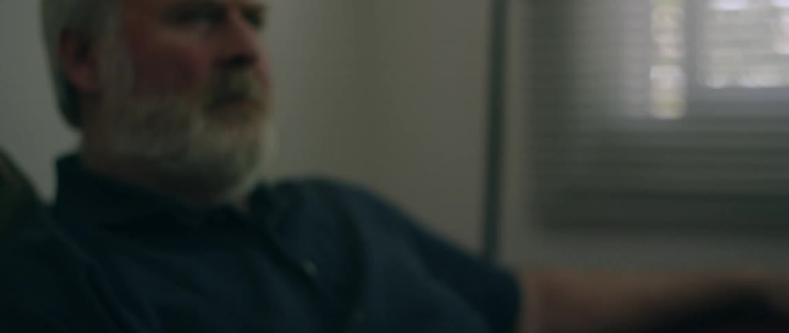 A man is watching something