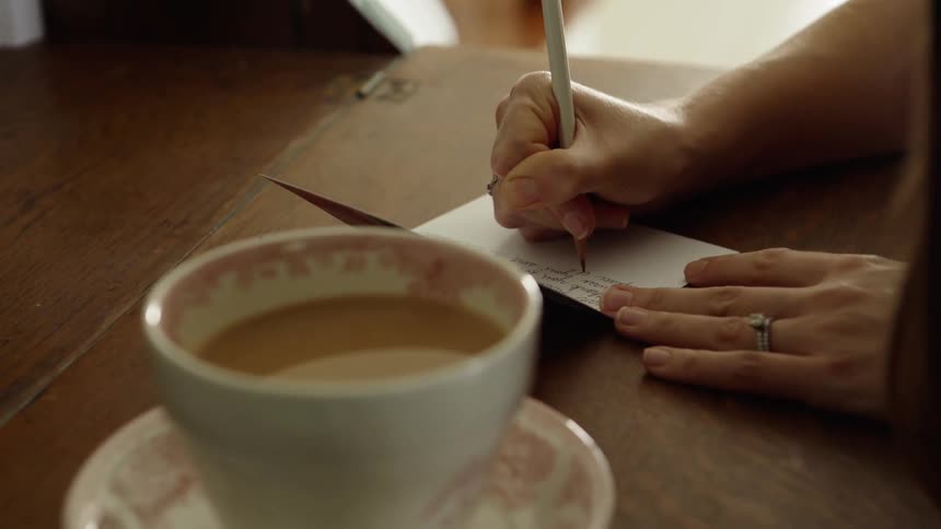 Woman Writes a Card