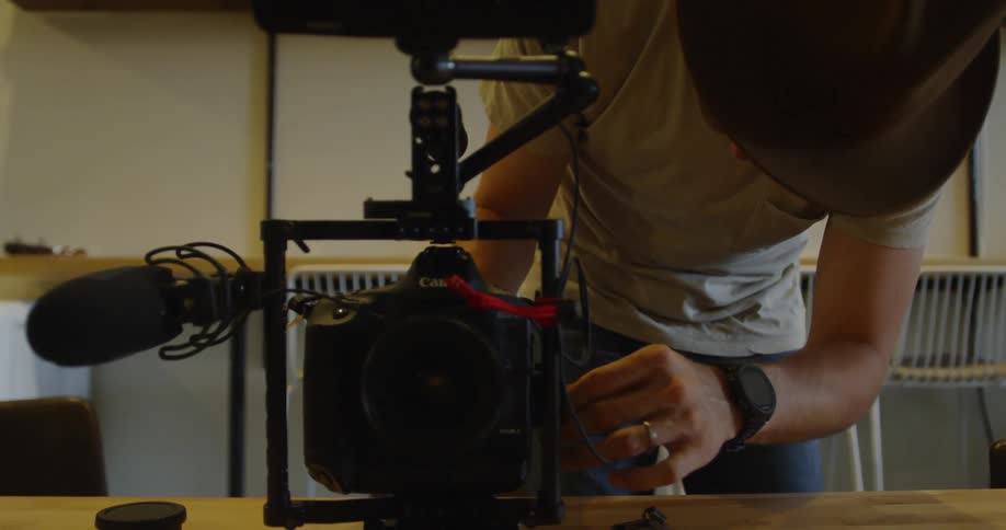 Man fixes a large camera