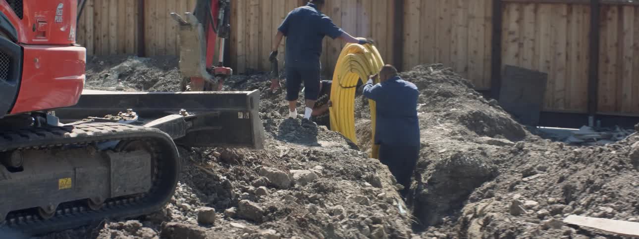 Men work at a construction site