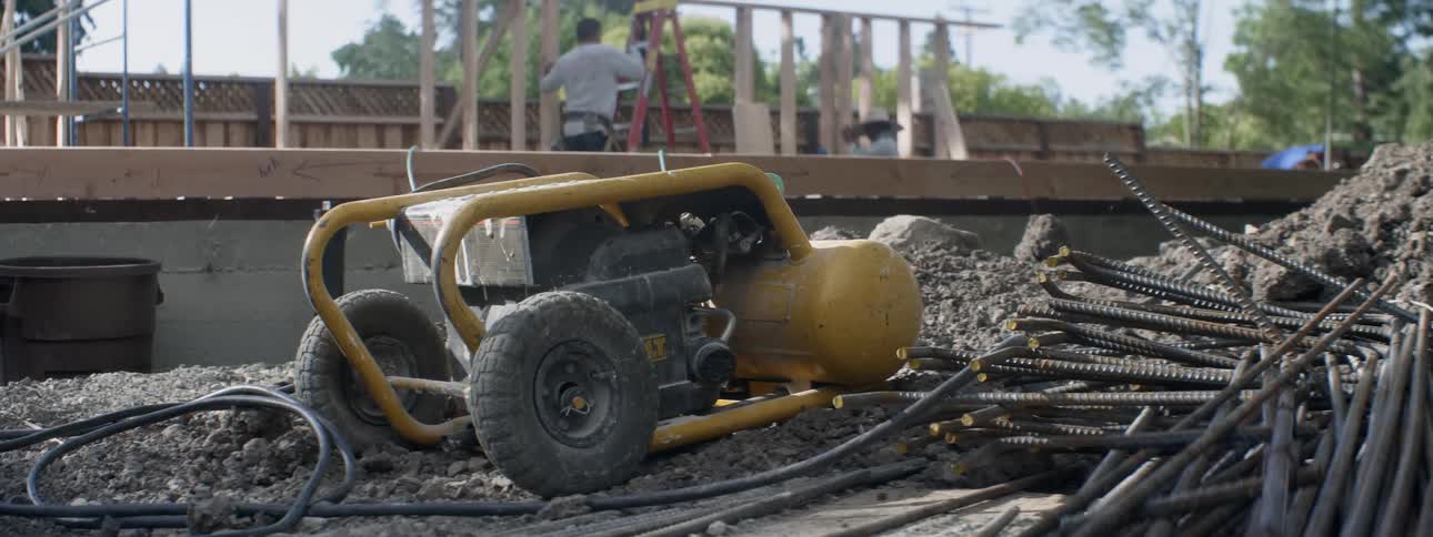 Men work at a construction site