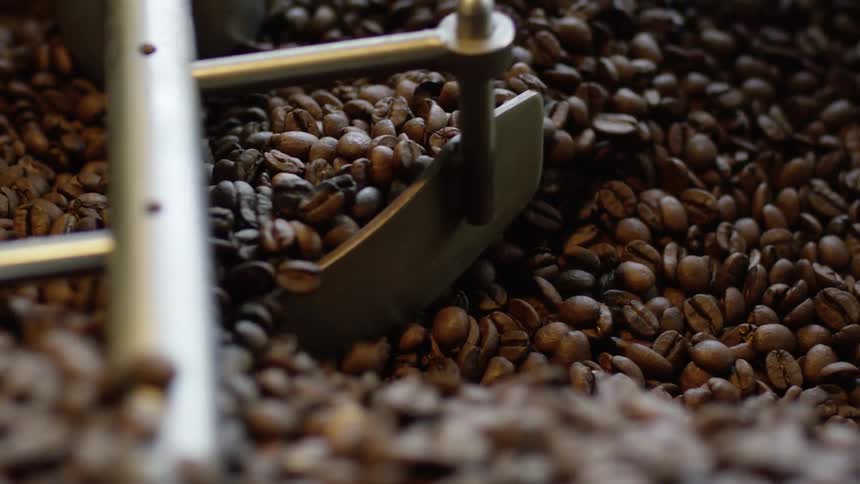 Coffee beans are stirred