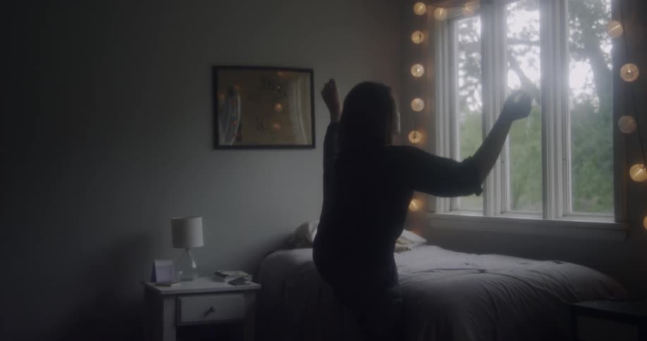 Woman Dancing Alone In Room