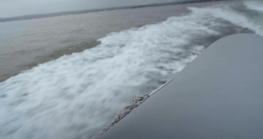 The boat is giving off waves as it travels