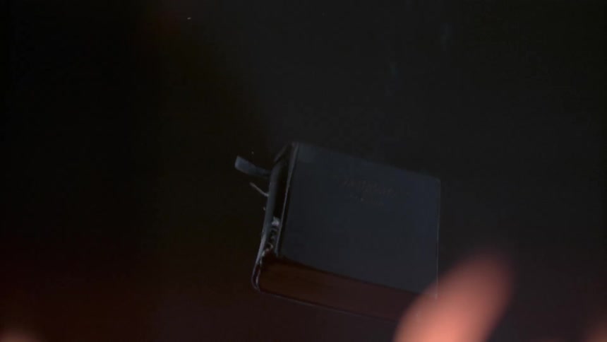 A book falls into a fire