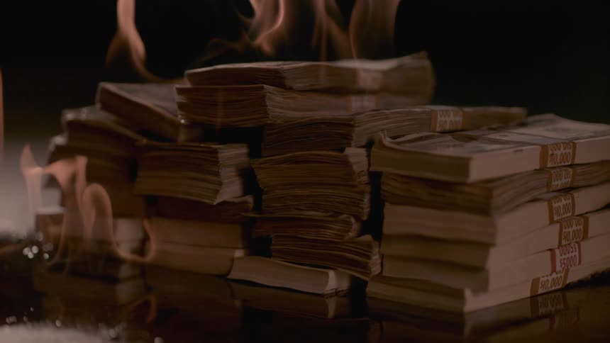 The stack of money is on fire