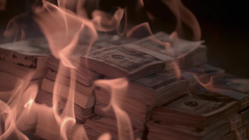 The pile of cash is on fire