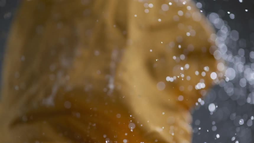 Raindrops Falling On Girl In Studio