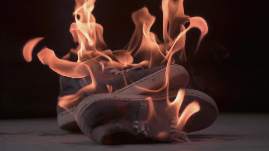 A pair of shoes is on fire