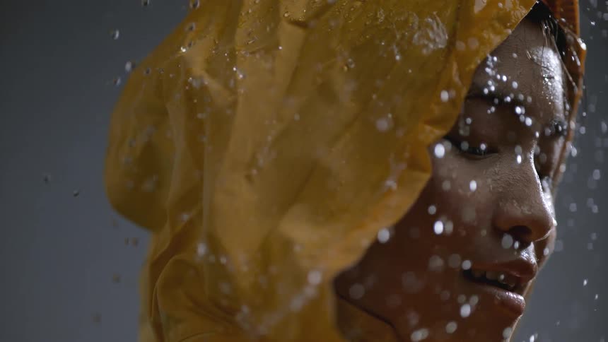 Raindrops Falling On Girl In Studio