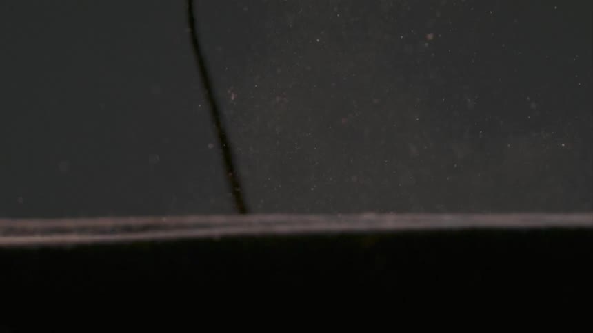 The camera is smashed with a sledge hammer