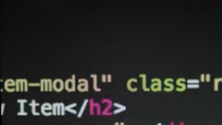 Code flashes on a computer screen