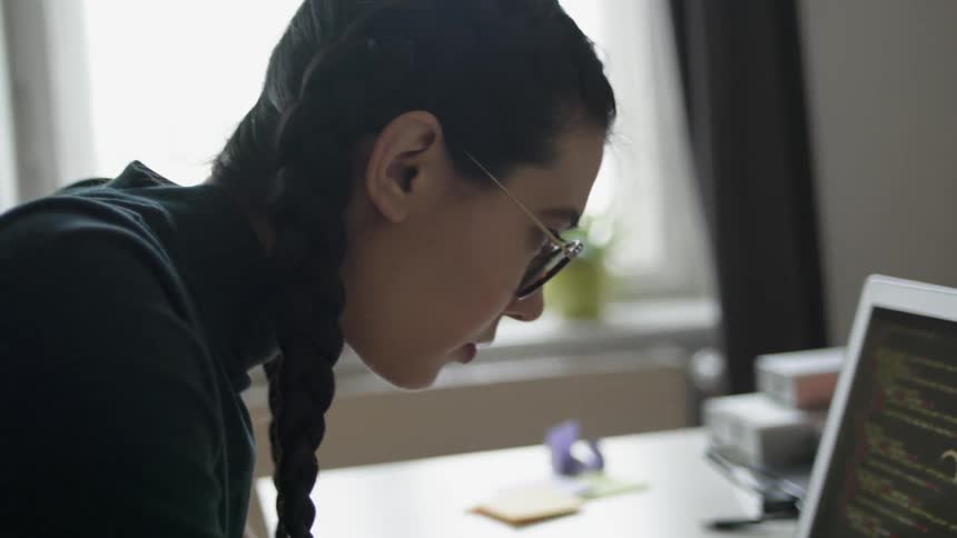 Woman Coding On Laptop