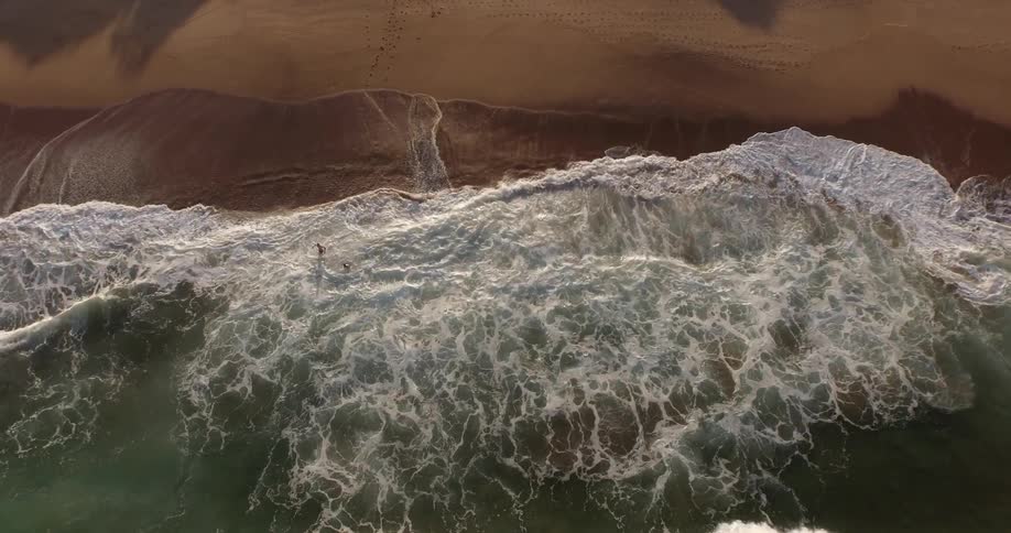 Water running ashore on a beach