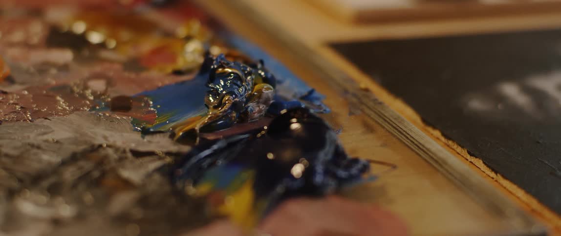 Thick paint covers a paint palette
