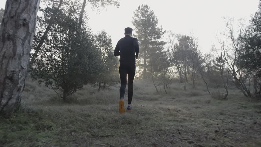 Man Running Through Forest And Dunes