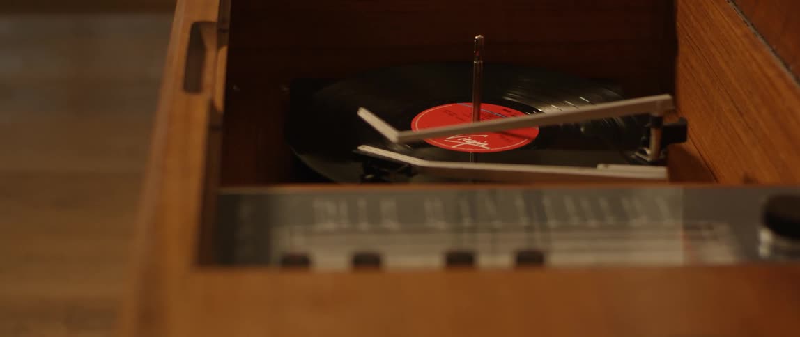 The record is playing on the machine