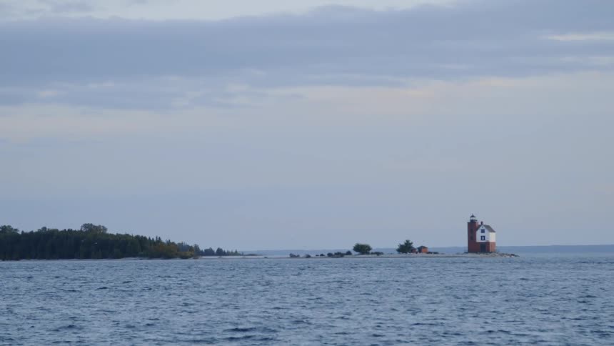 The water is rough near the island