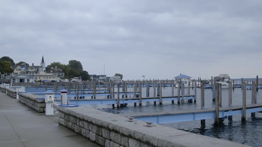 The pier is empty on a cloudy day