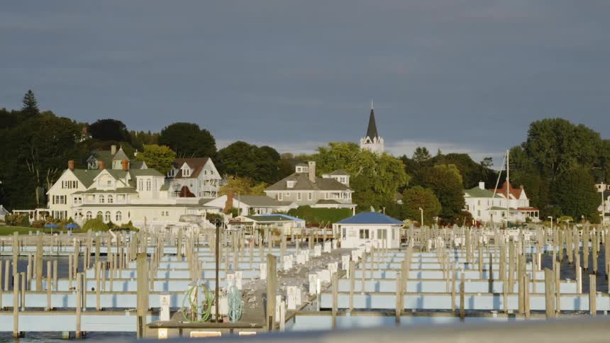 Many docks in two rows in a harbor