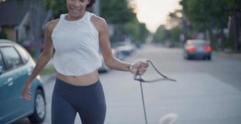 Woman Jogging With Dog