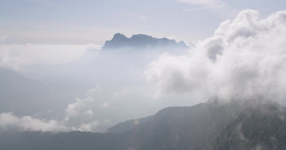 The heavy clouds cover the mountain range