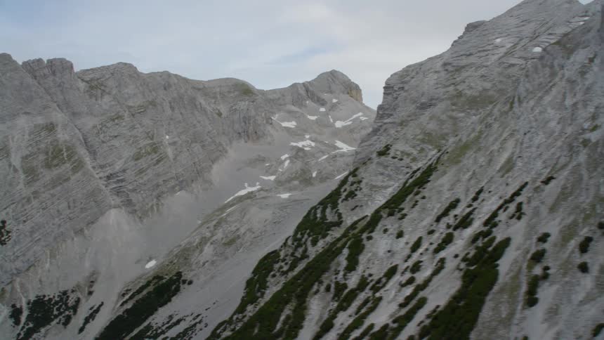 The mountain is gray at the top