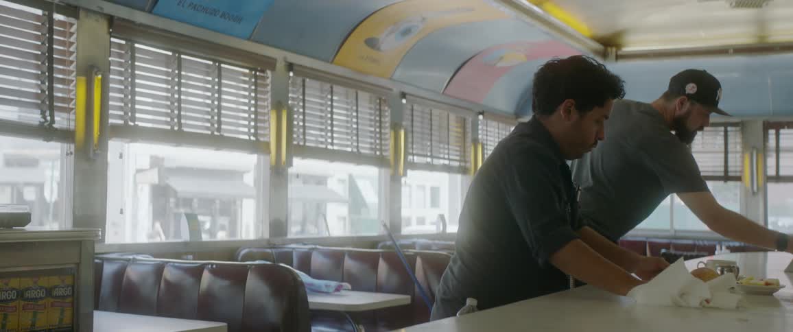 The men clean up the messy diner