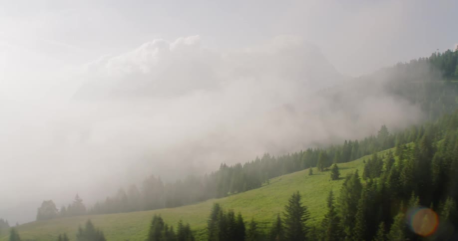 Fog is slowly rolling over the hills