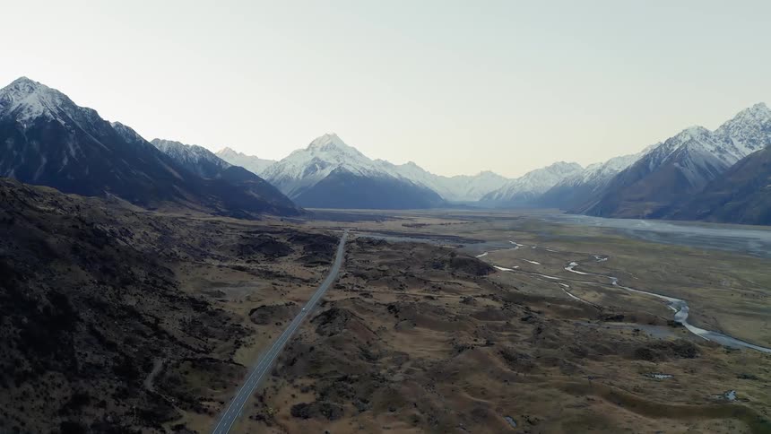 Roads wind through mountainous landscape