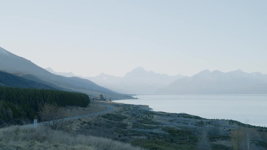 Road next to a river with a mountain view