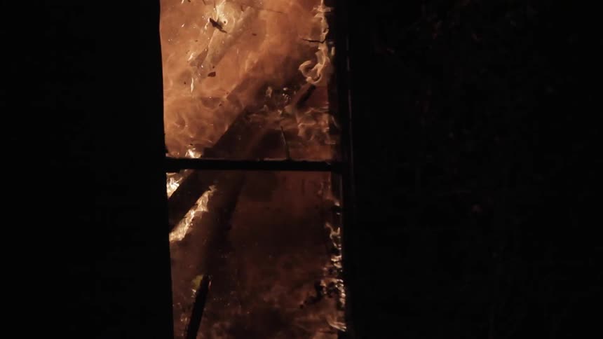 A fire is raging fire destroying everything in a home