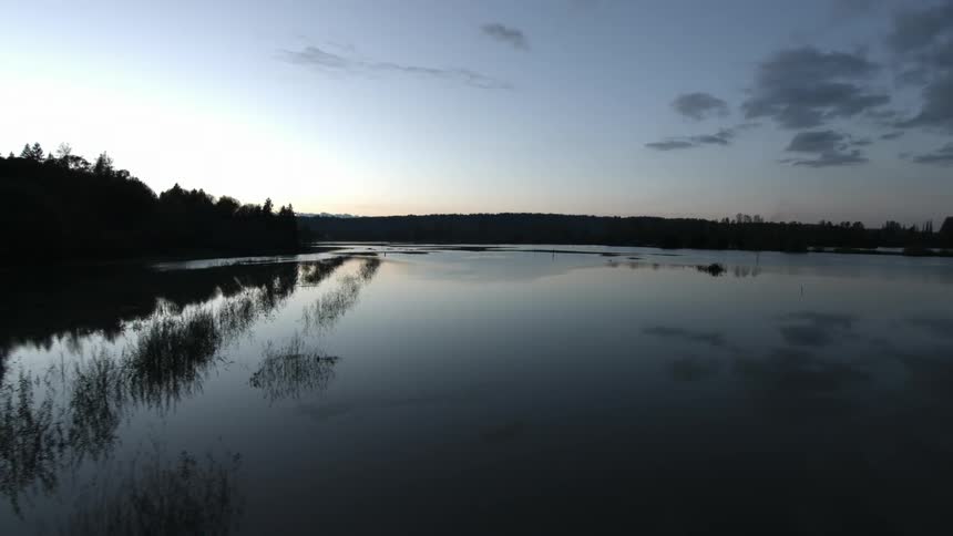 A still lake at dusk
