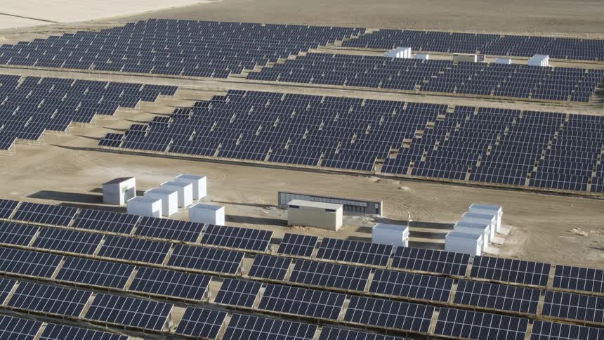 A field is filled with solar panels