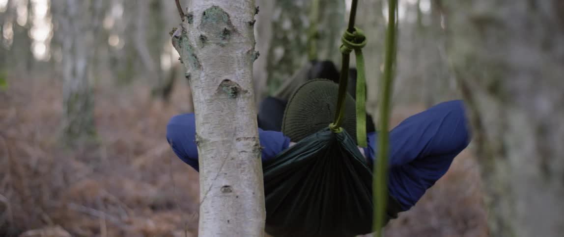 Man Camping In Woods