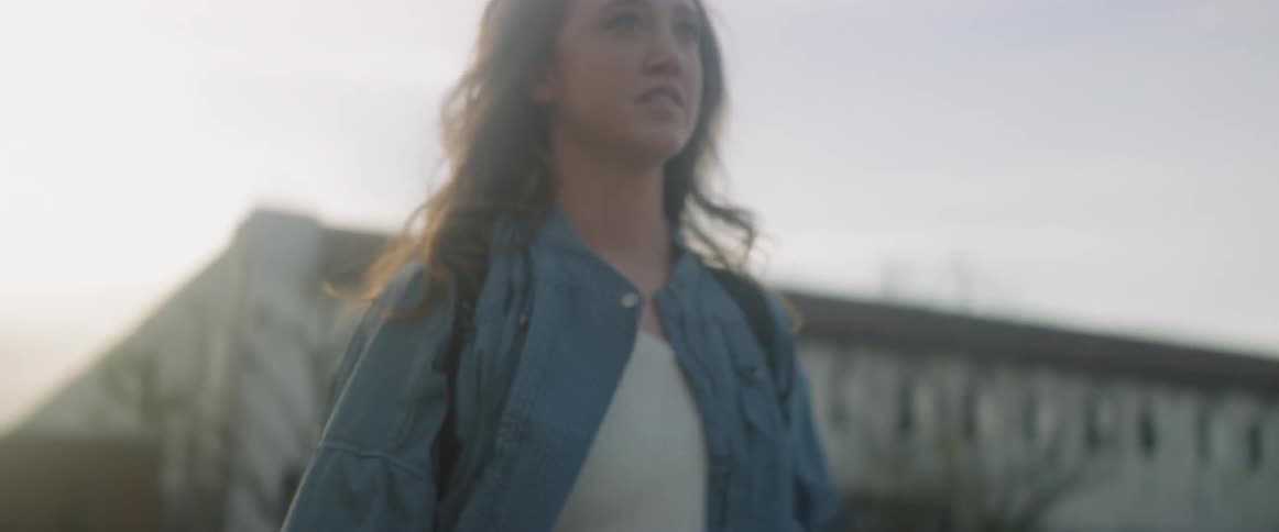 A woman walks outside
