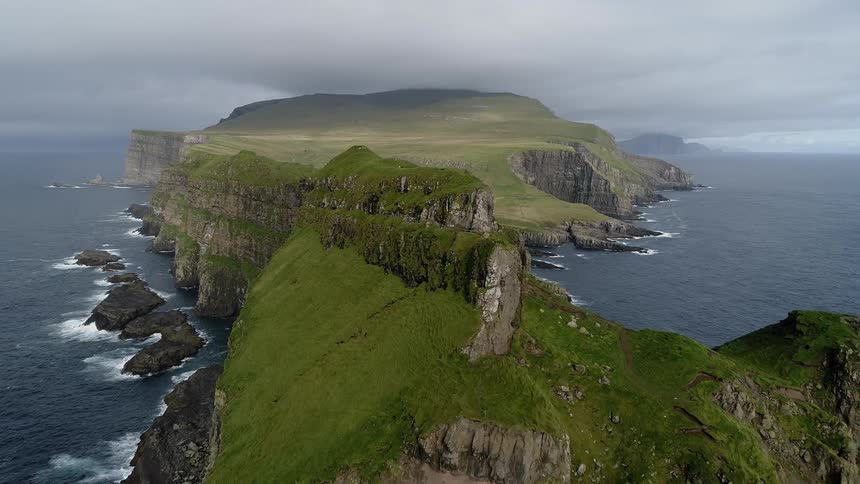 Beautiful lush green cliffside along the coast