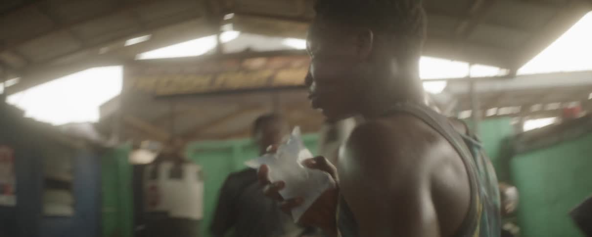 A man puts a cold pack up to his lip