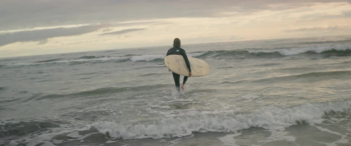 Man Meditating And Surfing