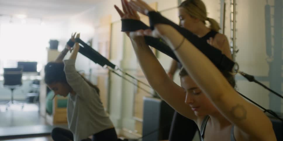 Woman using pulling strength training techniques