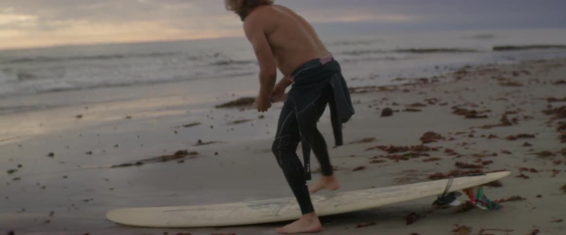 Man Meditating And Surfing