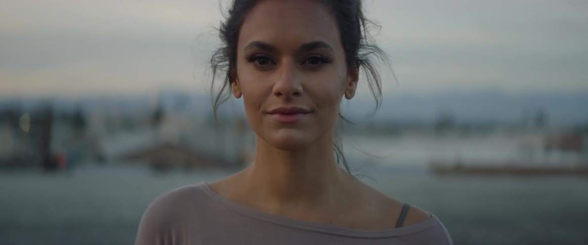 Dancers On Rooftop Overlooking City