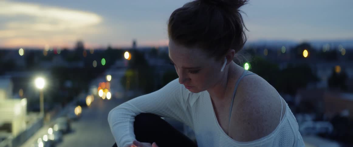 Dancers On Rooftop Overlooking City