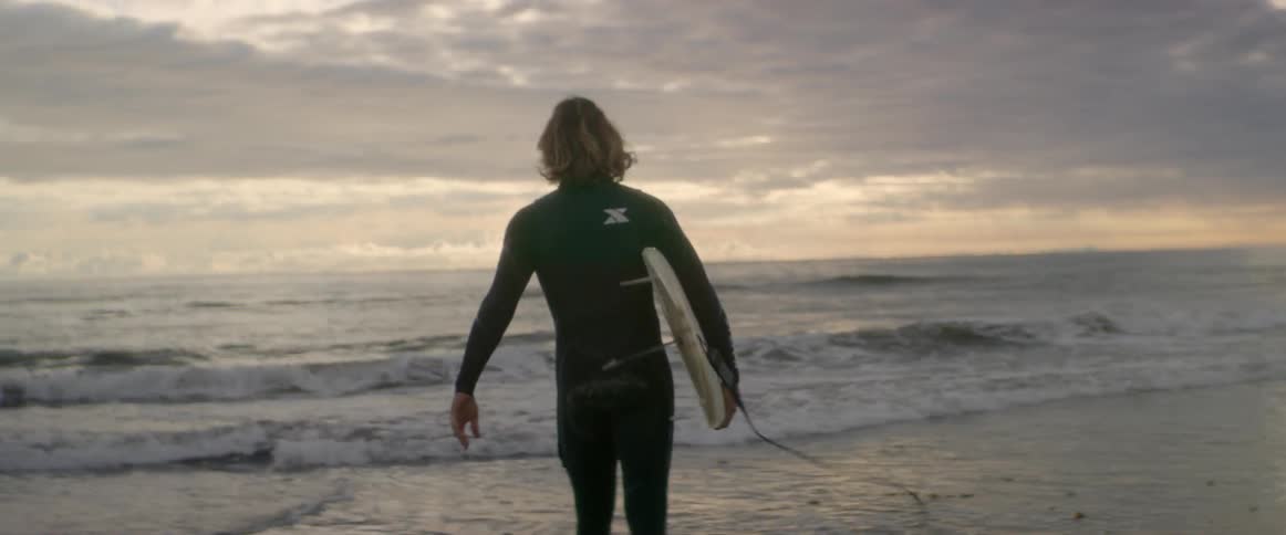 Man Meditating And Surfing