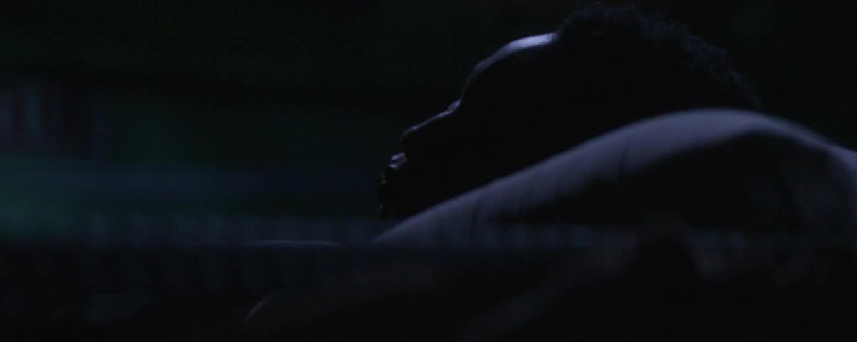 Young man sleeps on a pillow