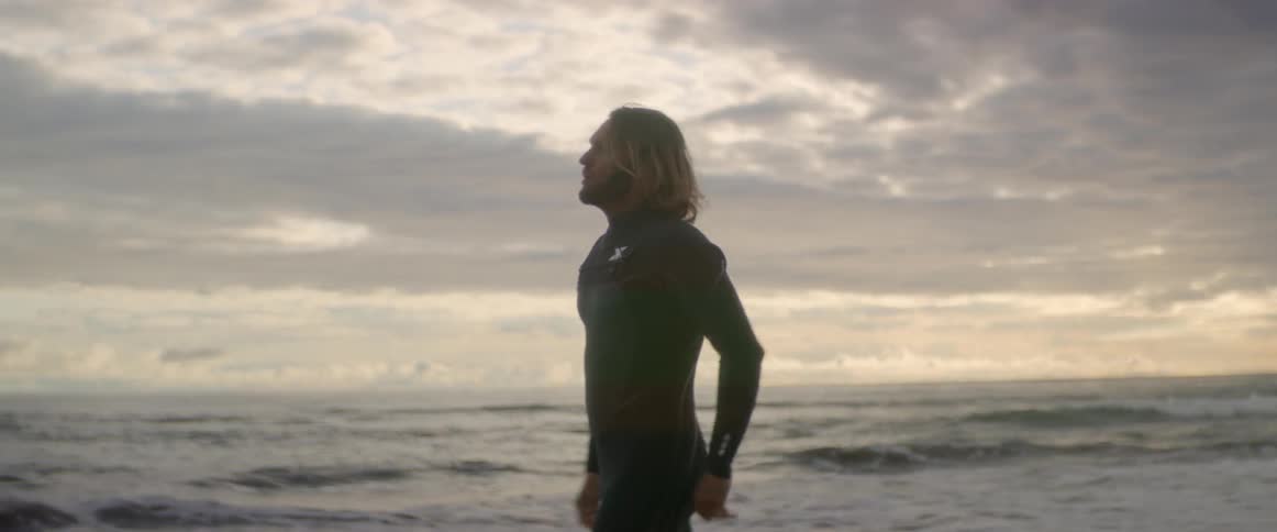 Man Meditating And Surfing