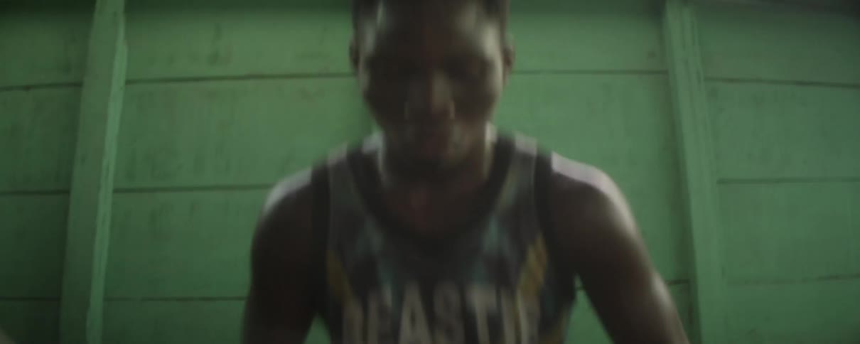 Young man jumps up and down on a spare tire