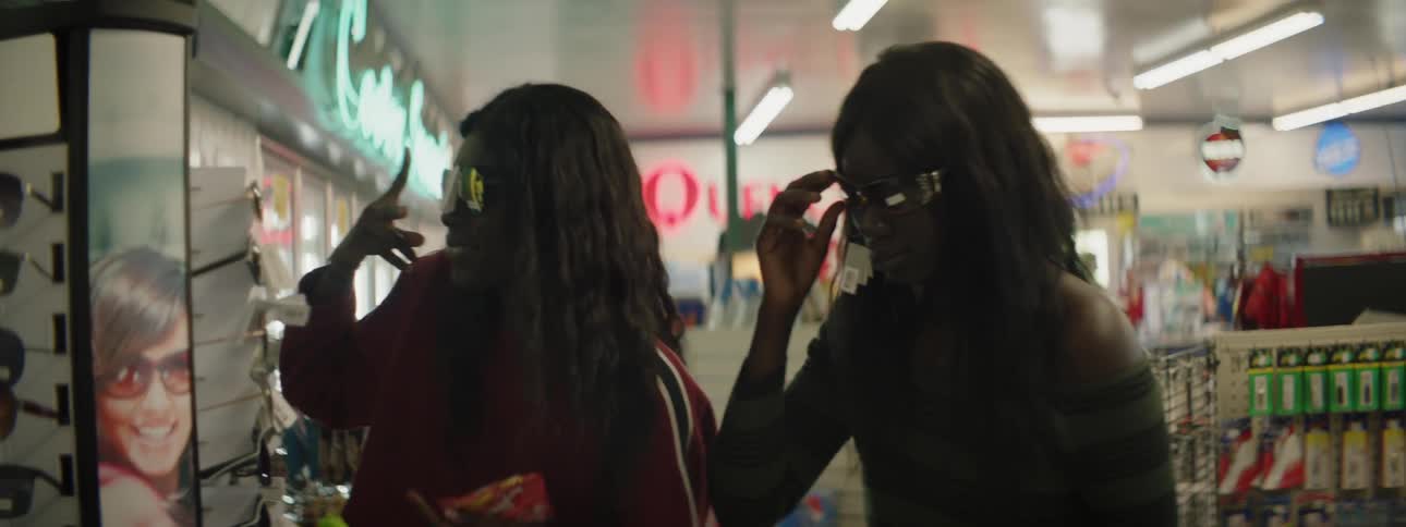 Sisters Filming Each Other With Camcorder