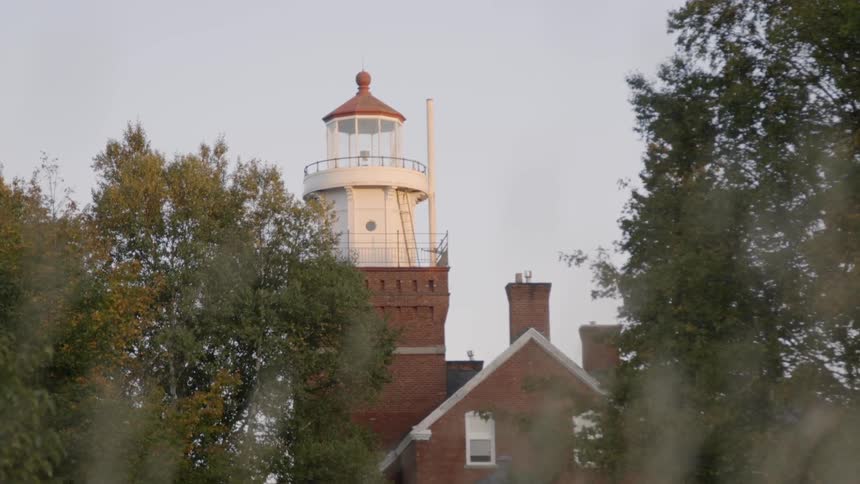 View of a house with a sea beacon tower