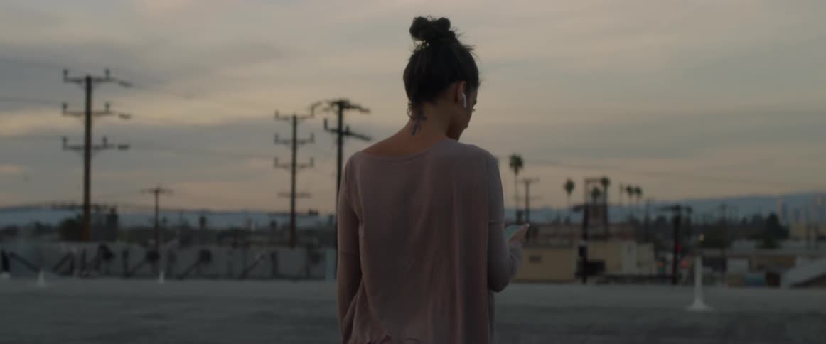 Dancers On Rooftop Overlooking City